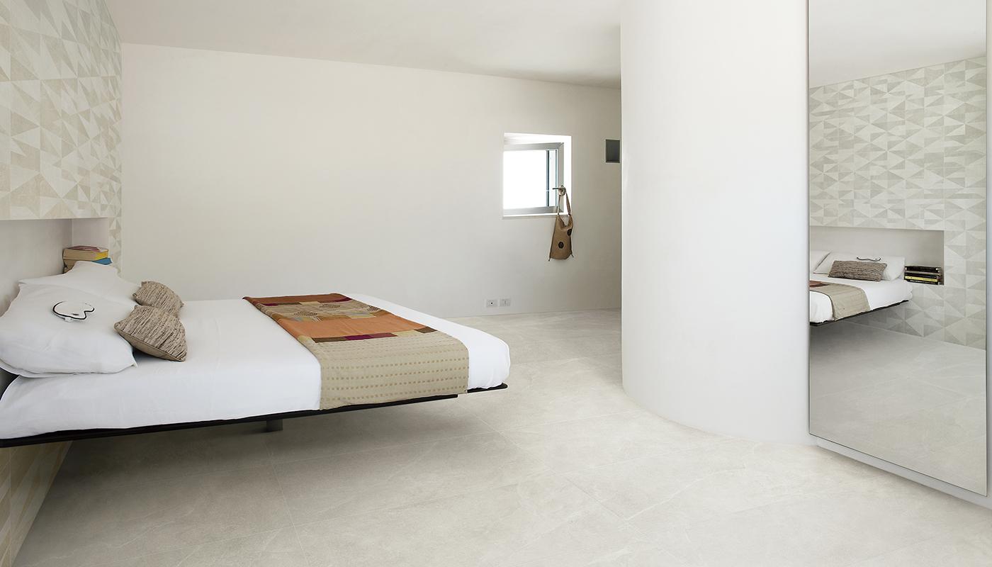 Sovrum med kall beige mönstrad klinker ifrån Eureka Sabbia
