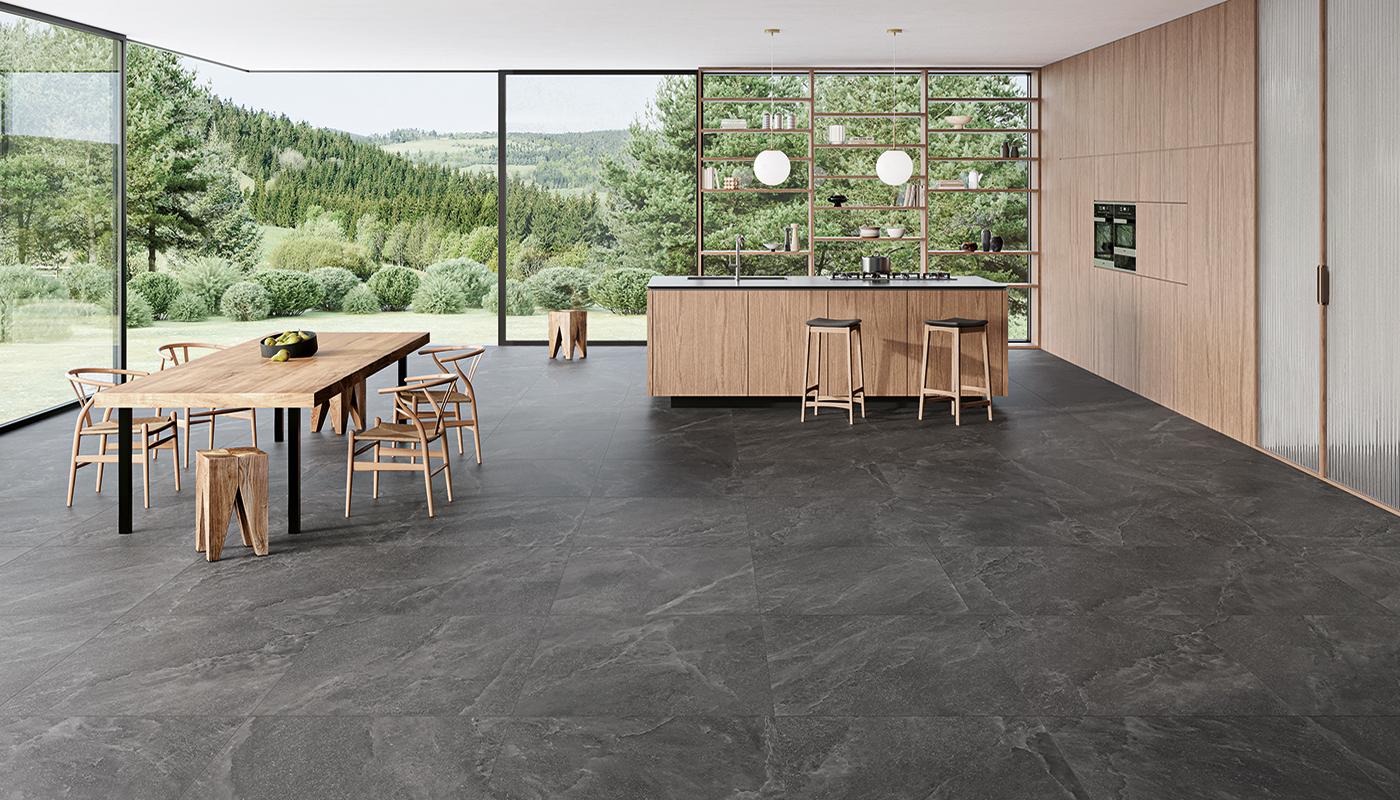 Kök och vardagsrum med grått golv ifrån provenza