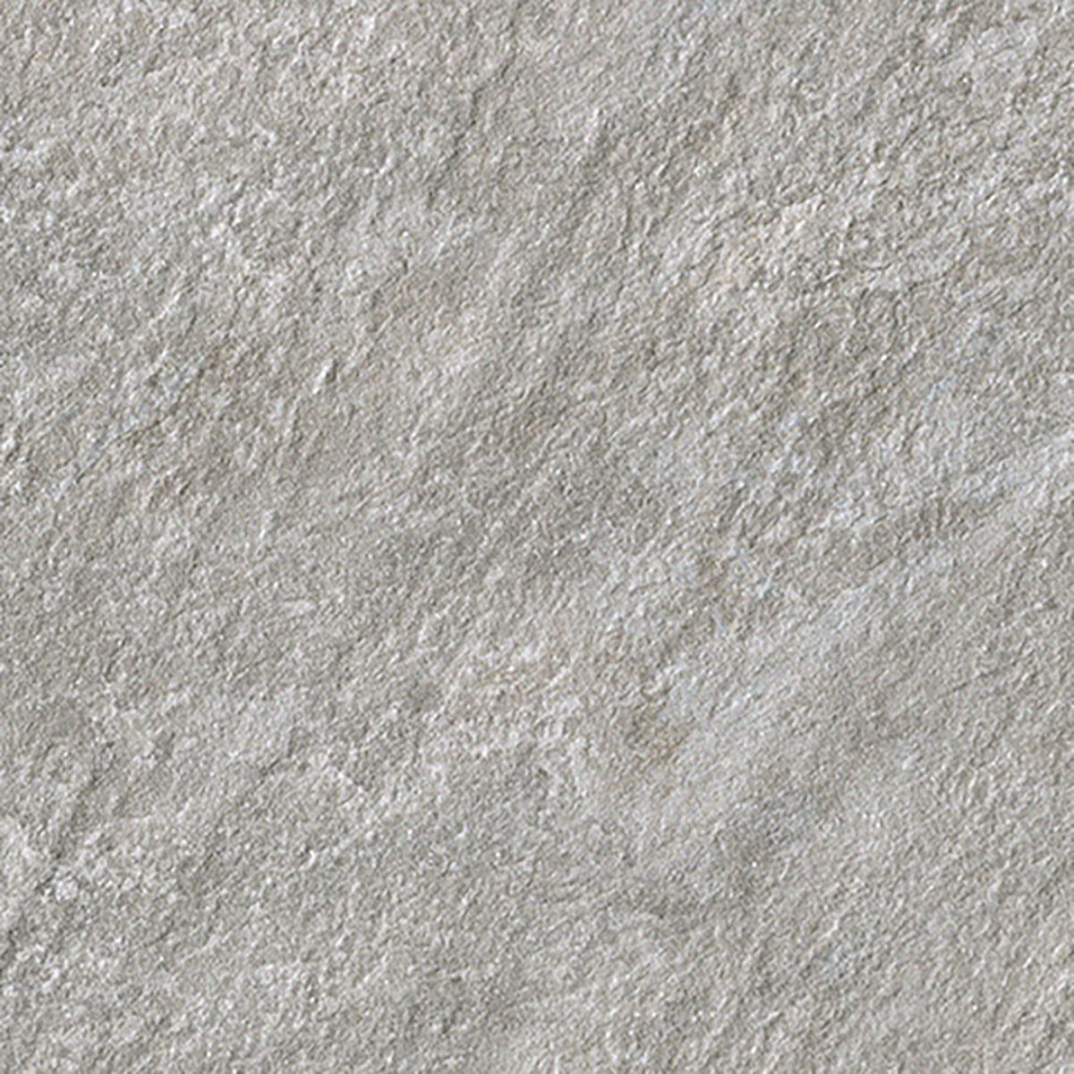Varmgrå stenliknande klinker med mönstrad yta ifrån Saime Ossido 